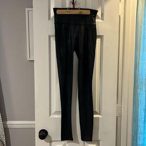 Spanx women’s stretch pull on legging pants in black opalescent.